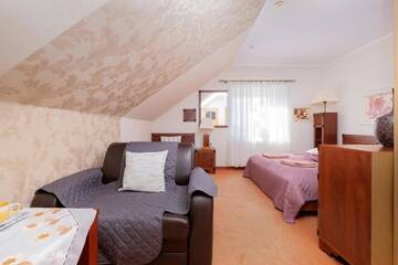 Фото номера Трехместный номер, вид на сад Проживание в семье Willa Studio г. Реваль 7