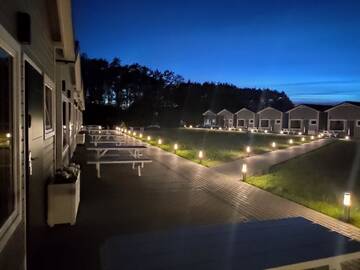 Фото номера Шале с двумя спальнями Дома для отпуска Lumi Resort Domki letniskowe г. Реваль 10