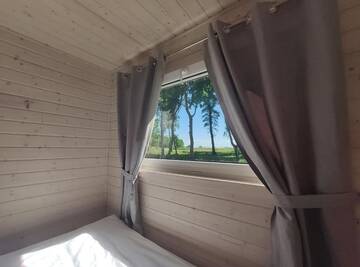 Фото номера Шале с двумя спальнями Дома для отпуска Lumi Resort Domki letniskowe г. Реваль 17