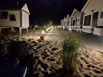 Фото номера Шале с двумя спальнями Дома для отпуска Lumi Resort Domki letniskowe г. Реваль 19