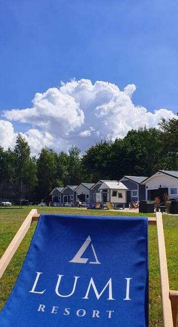 Фото номера Шале с двумя спальнями Дома для отпуска Lumi Resort Domki letniskowe г. Реваль 23